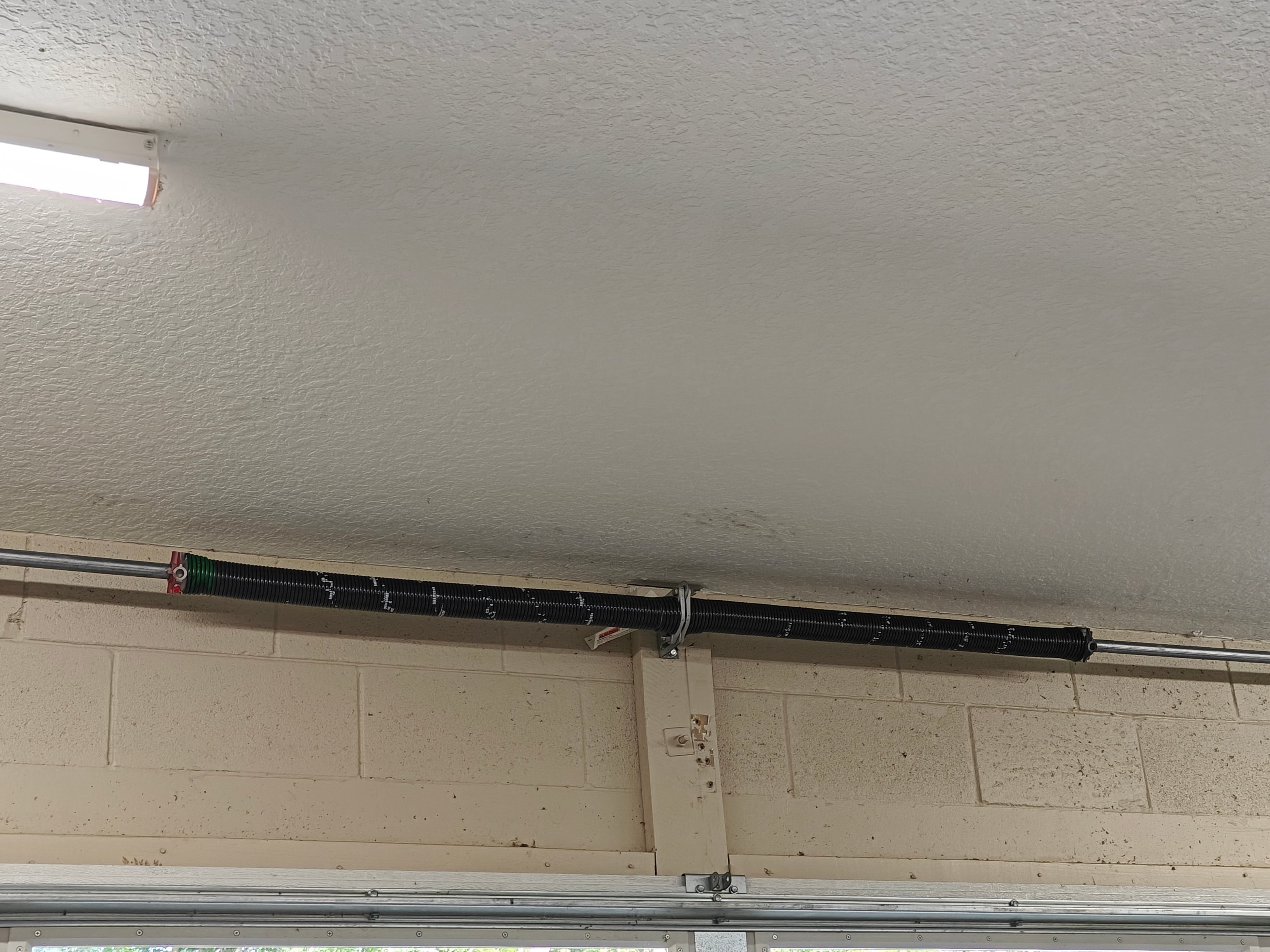 Garage Door Broken Spring Replacement and Repair in Winter Garden